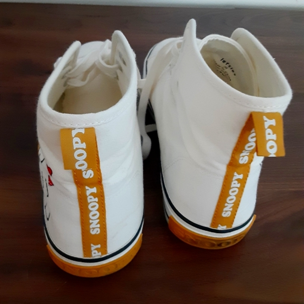 White canvas Snoopy high tops with gold trim